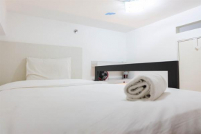 Elegant 2BR at 18th Floor Bassura City Apartment By Travelio